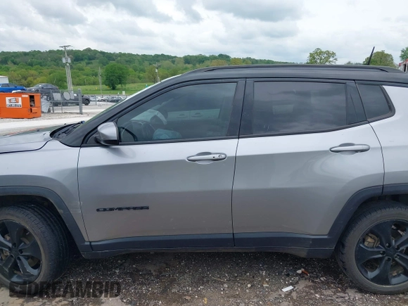2018 Jeep Compass Latitude with VIN 3C4NJDBB8JT323967, listed as a IAAI auction lot 42096644 with 143,761 mi miles and . Bid and sale history available at DreamBid. Image 14.