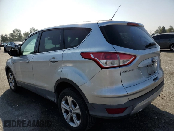 2013 Ford Escape SE with VIN 1FMCU9G91DUA14350, listed as a Copart auction lot 63651315 with 165,414 mi miles and Salvage title. Bid and sale history available at DreamBid. Image 2.