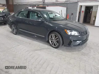 2016 Volkswagen Passat 1.8T S with VIN 1VWAT7A37GC060263, listed as a IAAI auction lot 41670530 with 82,983 mi miles. Bid and sale history available at carsss.com. Image 1.