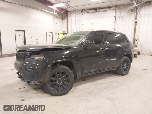 2018 Jeep Grand Cherokee Laredo E with VIN 1C4RJFAG5JC417701, listed as a IAAI auction lot 42001159 with 110,767 mi miles and . Bid and sale history available at DreamBid. Image 2.