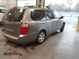 2010 Kia Sedona LX with VIN KNDMG4C31A6331565, listed as a IAAI auction lot 41860255 with 219,233 mi miles. Bid and sale history available at carsss.com. Image 4.
