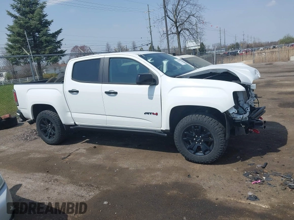 2021 GMC Canyon 4WD AT4 z VIN 1GTG6FENXM1291689, wystawiony jako IAAI lot #42038884 z przebiegiem 54 884 mil mil oraz . Historia ofert i sprzedaży dostępna na DreamBid. Obrazek 13.