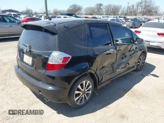 2013 Honda Fit Sport with VIN JHMGE8H57DC049293, listed as a IAAI auction lot 41757899 with 113,963 mi miles. Bid and sale history available at carsss.com. Image 4.