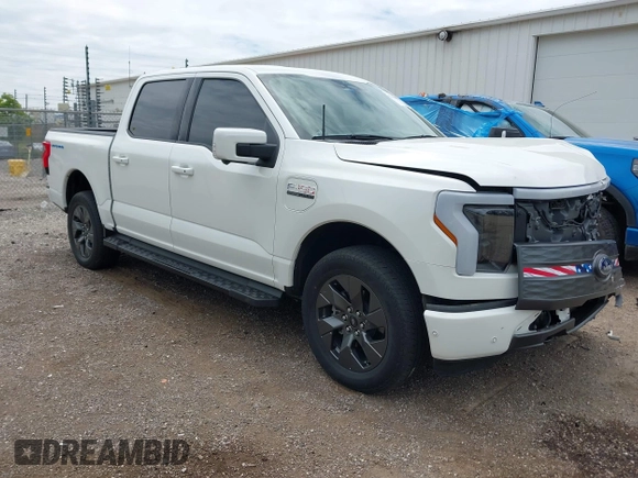2022 Ford F-150 Lightning Pro with VIN 1FTVW1EL3NWG16132, listed as a IAAI auction lot 42362459 with 16,509 mi miles and . Bid and sale history available at DreamBid. Image 1.