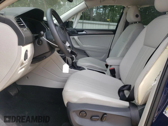 2023 Volkswagen Tiguan SE with VIN 3VV3B7AX9PM102224, listed as a Copart auction lot 57221585 with 21,202 mi miles and Salvage title. Bid and sale history available at DreamBid. Image 7.
