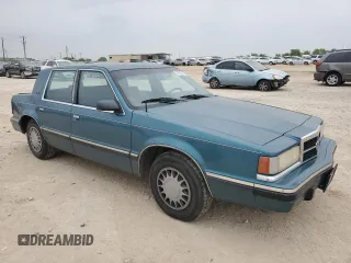 1993 Dodge Dynasty LE z VIN 1B3XC56R3PD124521, wystawiony jako Copart lot #51825725 z przebiegiem 94 336 mil mil oraz Szkoda całkowita • Salvage title. Historia ofert i sprzedaży dostępna na DreamBid. Obrazek 4.