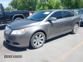 2011 Buick LaCrosse CXS with VIN 1G4GE5ED8BF254463, listed as a IAAI auction lot 42335898 with 264,476 mi miles and . Bid and sale history available at DreamBid. Image 2.