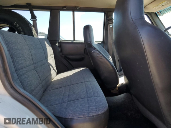 2000 Jeep Cherokee with VIN 1J4FF48S6YL169224, listed as a Copart auction lot 64411145 with 237,553 mi miles and Clean title. Bid and sale history available at DreamBid. Image 11.