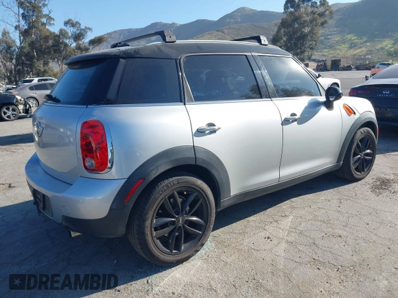 2013 MINI Countryman with VIN WMWZB3C59DWM09740, listed as a IAAI auction lot 41648192 with 145,915 mi miles and . Bid and sale history available at DreamBid. Image 4.