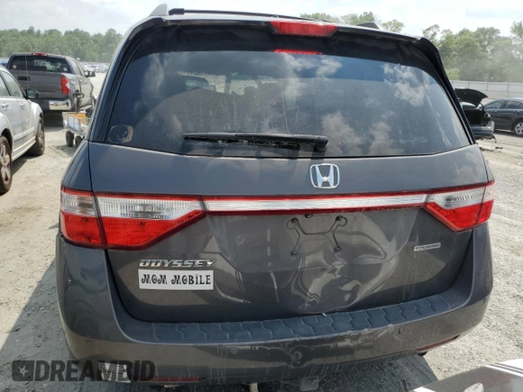 2011 Honda Odyssey Touring with VIN 5FNRL5H91BB045838, listed as a Copart auction lot 59612315 with Not provided miles and Salvage title. Bid and sale history available at DreamBid. Image 6.
