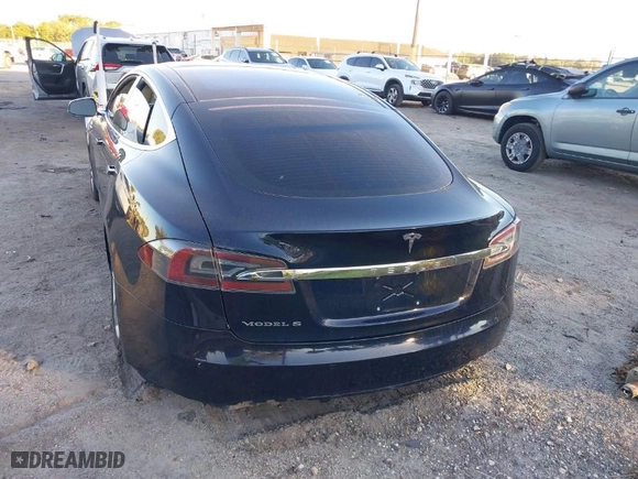 2013 Tesla Model S with VIN 5YJSA1DN9DFP06165, listed as a IAAI auction lot 40920844 with 181,342 mi miles. Bid and sale history available at carsss.com. Image 15.