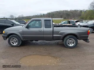 2005 Mazda B-Series 4WD Truck SE with VIN 4F4ZR47E15PM05750, listed as a IAAI auction lot 41850056 with 163,605 mi miles. Bid and sale history available at carsss.com. Image 14.