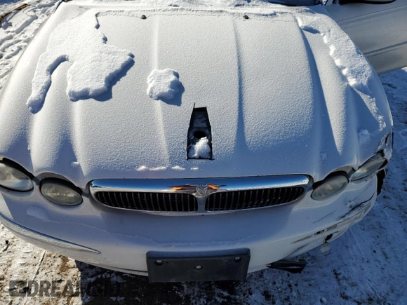 2005 Jaguar X-Type z VIN SAJWB52D95XE21462, wystawiony jako Copart lot #89216475 z przebiegiem 114 257 mil mil oraz Szkoda całkowita • Salvage title. Historia ofert i sprzedaży dostępna na DreamBid. Obrazek 11.