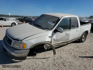 2001 Ford F-150 SuperCrew XLT with VIN 1FTRW07L21KB29790, listed as a Copart auction lot 76416684 with 221,631 mi miles and Salvage Title. Bid and sale history available at carsss.com. Image 1.