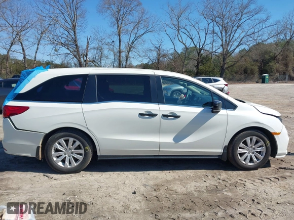 2019 Honda Odyssey LX with VIN 5FNRL6H23KB049236, listed as a IAAI auction lot 41633339 with 96,000 mi miles and . Bid and sale history available at DreamBid. Image 13.