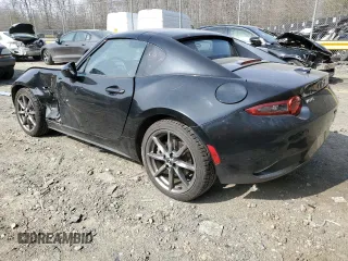 2021 Mazda MX-5 Miata Grand Touring with VIN JM1NDAM71M0451354, listed as a Copart auction lot 47756025 with 53,347 mi miles and Salvage title. Bid and sale history available at DreamBid. Image 2.