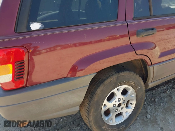 2003 Jeep Grand Cherokee Laredo with VIN 1J4GX48S93C523831, listed as a IAAI auction lot 41852442 with 270,735 mi miles. Bid and sale history available at carsss.com. Image 15.