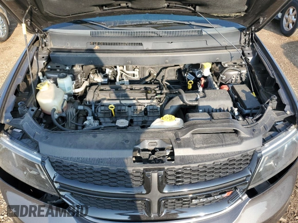 2016 Dodge Journey Crossroad z VIN 3C4PDCGB4GT171990, wystawiony jako Copart lot #62869914 z przebiegiem 130 803 mil mil oraz Szkoda całkowita • Salvage title. Historia ofert i sprzedaży dostępna na DreamBid. Obrazek 11.