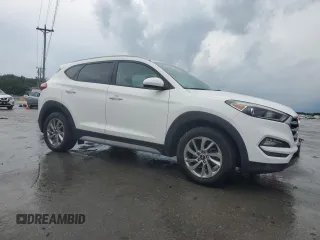 2018 Hyundai Tucson SEL with VIN KM8J3CA46JU738213, listed as a Copart auction lot 59138215 with 136,515 mi miles and Clean title. Bid and sale history available at DreamBid. Image 4.