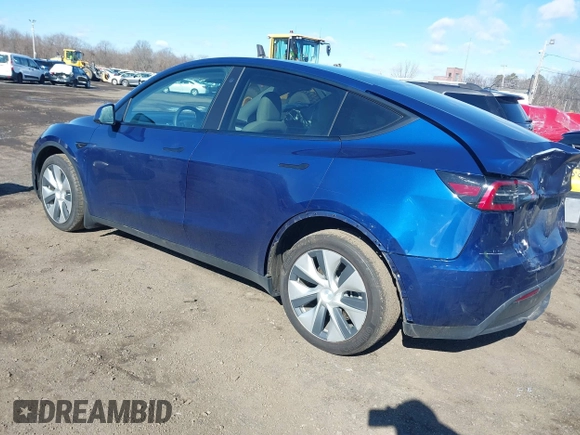 2021 Tesla Model Y Long Range with VIN 5YJYGDEE8MF293230, listed as a IAAI auction lot 41744033 with 56,797 mi miles and . Bid and sale history available at DreamBid. Image 3.