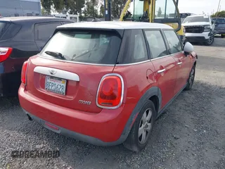 2015 MINI Hardtop 4 Door with VIN WMWXS5C59FT832549, listed as a IAAI auction lot 42106686 with 149,358 mi miles and . Bid and sale history available at DreamBid. Image 4.