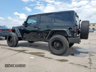 2014 Jeep Wrangler Unlimited Rubicon с VIN 1C4HJWFG1EL156853, выставлен на аукционе Copart как лот 58496795 с пробегом 112 073 миль миль и Списание • Salvage title. История ставок и продаж доступна на DreamBid. Изображение 2.