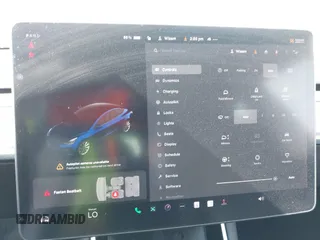 2020 Tesla Model 3 Standard Range Plus z VIN 5YJ3E1EA5LF708885, wystawiony jako IAAI lot #42172952 z przebiegiem 58 882 mil mil oraz . Historia ofert i sprzedaży dostępna na DreamBid. Obrazek 19.