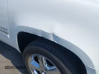 2013 Chevrolet Tahoe LTZ with VIN 1GNSKCE04DR374682, listed as a IAAI auction lot 42779526 with 139,533 mi miles and . Bid and sale history available at DreamBid. Image 6.