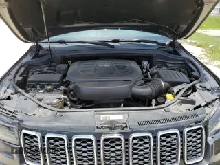 2018 Jeep Grand Cherokee Limited z VIN 1C4RJEBG9JC159384, wystawiony jako Copart lot #59882585 z przebiegiem 130 089 mil mil oraz Szkoda całkowita • Salvage title. Historia ofert i sprzedaży dostępna na DreamBid. Obrazek 12.