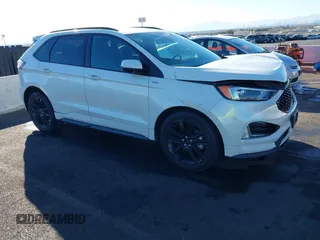 2020 Ford Edge SEL z VIN 2FMPK3J92LBB53467, wystawiony jako IAAI lot #41241115 z przebiegiem 58 183 mil mil oraz . Historia ofert i sprzedaży dostępna na DreamBid. Obrazek 1.