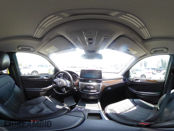 2014 Mercedes-Benz GL 450 z VIN 4JGDF7CE9EA411572, wystawiony jako IAAI lot #42461631 z przebiegiem 121 885 mil mil oraz . Historia ofert i sprzedaży dostępna na DreamBid. Obrazek 18.