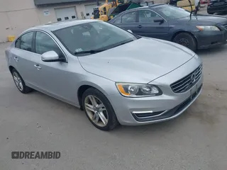 2015 Volvo S60 T5 Premier z VIN YV1612TB0F2316022, wystawiony jako IAAI lot #42331989 z przebiegiem 107 167 mil mil oraz . Historia ofert i sprzedaży dostępna na DreamBid. Obrazek 1.