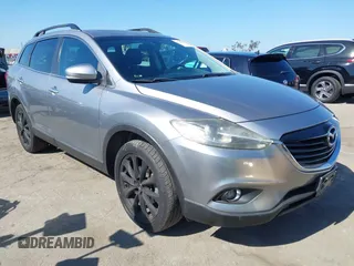 2014 Mazda CX-9 Grand Touring z VIN JM3TB3DV9E0437380, wystawiony jako IAAI lot #42298066 z przebiegiem 169 644 mil mil oraz . Historia ofert i sprzedaży dostępna na DreamBid. Obrazek 1.