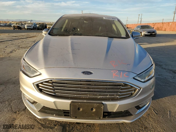 2017 Ford Fusion Energi Titanium with VIN 3FA6P0SUXHR379807, listed as a Copart auction lot 84885494 with 100,735 mi miles and Salvage Title. Bid and sale history available at carsss.com. Image 5.