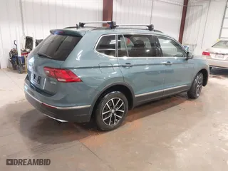 2021 Volkswagen Tiguan SE with VIN 3VV2B7AX6MM077337, listed as a IAAI auction lot 41345637 with 62,989 mi miles. Bid and sale history available at carsss.com. Image 4.