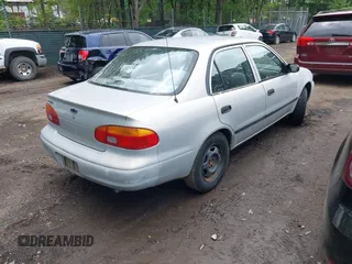 2001 Chevrolet Prizm z VIN 1Y1SK52841Z448303, wystawiony jako IAAI lot #42224410 z przebiegiem 160 577 mil mil oraz . Historia ofert i sprzedaży dostępna na DreamBid. Obrazek 4.