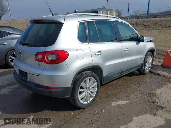 2011 Volkswagen Tiguan SE with VIN WVGBV7AX2BW562055, listed as a IAAI auction lot 41642084 with 175,407 mi miles and . Bid and sale history available at DreamBid. Image 4.