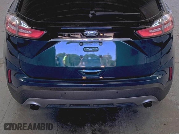 2020 Ford Edge Titanium z VIN 2FMPK3K91LBB37761, wystawiony jako IAAI lot #42829390 z przebiegiem 90 117 mil mil oraz . Historia ofert i sprzedaży dostępna na DreamBid. Obrazek 6.