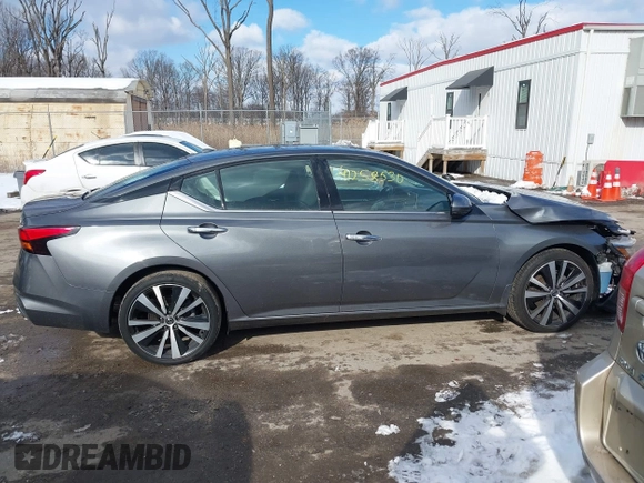 2019 Nissan Altima 2.5 Platinum with VIN 1N4BL4FWXKC158811, listed as a IAAI auction lot 41258530 with 64,779 mi miles. Bid and sale history available at carsss.com. Image 13.