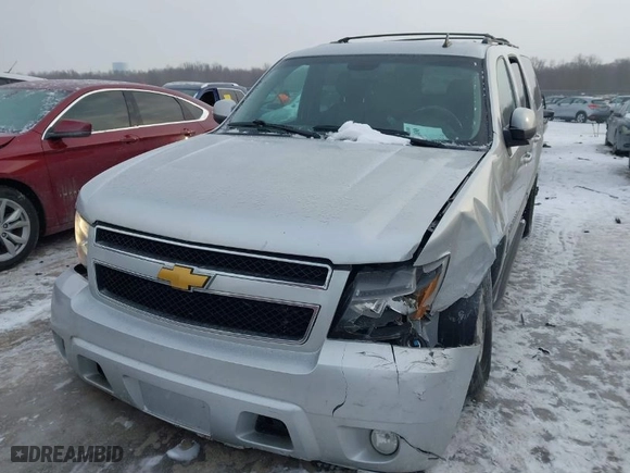 2014 Chevrolet Suburban LT with VIN 1GNSKJE7XER226670, listed as a IAAI auction lot 41301490 with 157,842 mi miles. Bid and sale history available at carsss.com. Image 2.