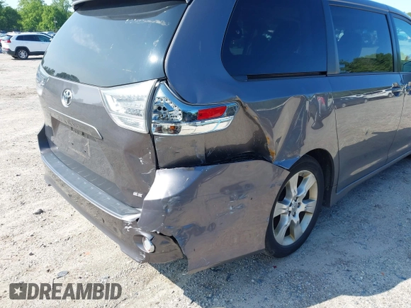 2012 Toyota Sienna SE with VIN 5TDXK3DCXCS267405, listed as a IAAI auction lot 42401101 with 134,553 mi miles and . Bid and sale history available at DreamBid. Image 6.