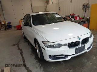 2014 BMW 3 Series 328i xDrive with VIN WBA3B5C53EP543964, listed as a IAAI auction lot 41856923 with 149,440 mi miles. Bid and sale history available at carsss.com. Image 1.