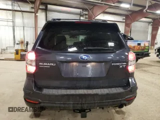 2014 Subaru Forester XT Touring with VIN JF2SJGMC0EH517859, listed as a Copart auction lot 46973505 with 117,907 mi miles and Salvage Title. Bid and sale history available at DreamBid. Image 6.