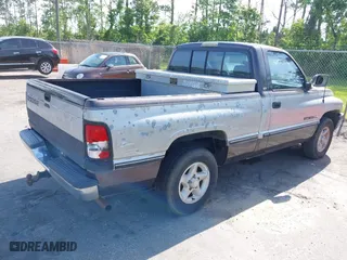 1997 Dodge Ram 1500 with VIN 1B7HC16Y2VJ509957, listed as a IAAI auction lot 42100719 with 133,165 mi miles. Bid and sale history available at carsss.com. Image 4.