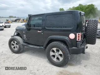 2017 Jeep Wrangler Sahara z VIN 1C4AJWBG8HL547512, wystawiony jako Copart lot #53884095 z przebiegiem 107 260 mil mil oraz Szkoda całkowita • Salvage title. Historia ofert i sprzedaży dostępna na DreamBid. Obrazek 2.