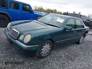 1998 Mercedes-Benz E-Class with VIN WDBJF65FXWA589630, listed as a IAAI auction lot 41990725 with 102,149 mi miles. Bid and sale history available at carsss.com. Image 17.