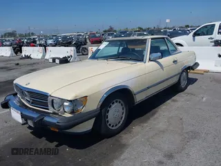 1987 Mercedes-Benz 560 SL с VIN WDBBA48D2HA061438, выставлен на аукционе IAAI как лот 42419798 с пробегом 123 332 миль миль и . История ставок и продаж доступна на DreamBid. Изображение 2.