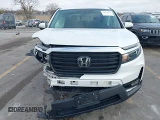 2023 Honda Ridgeline RTL with VIN 5FPYK3F55PB018188, listed as a IAAI auction lot 41952319 with 73,019 mi miles and . Bid and sale history available at DreamBid. Image 12.