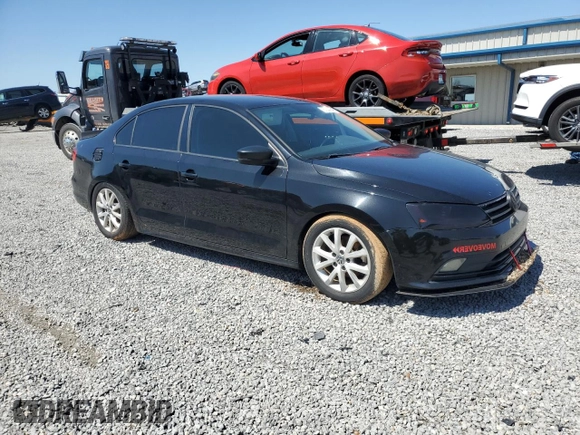 2015 Volkswagen Jetta SE with VIN 3VWD07AJ0FM414285, listed as a Copart auction lot 51930645 with 136,618 mi miles and Salvage title. Bid and sale history available at DreamBid. Image 4.