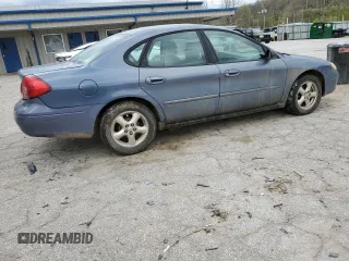 2000 Ford Taurus SE z VIN 1FAFP53U5YA259273, wystawiony jako Copart lot #52787305 z przebiegiem 234 848 mil mil oraz Szkoda całkowita • Salvage title. Historia ofert i sprzedaży dostępna na DreamBid. Obrazek 3.
